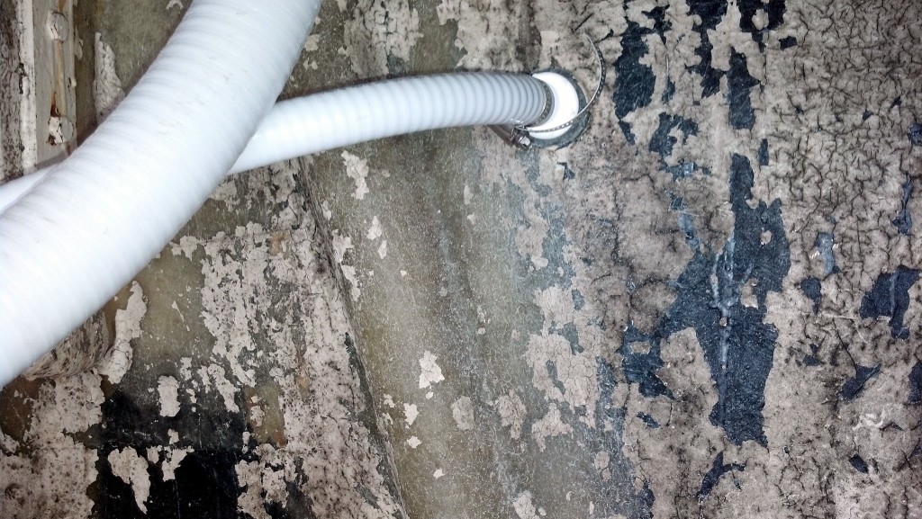The last part was connecting the vent line hose with a hose clamp.