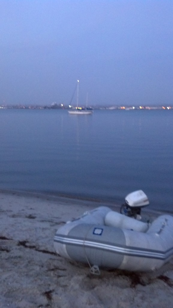 Still securely anchored off the strand before sunset