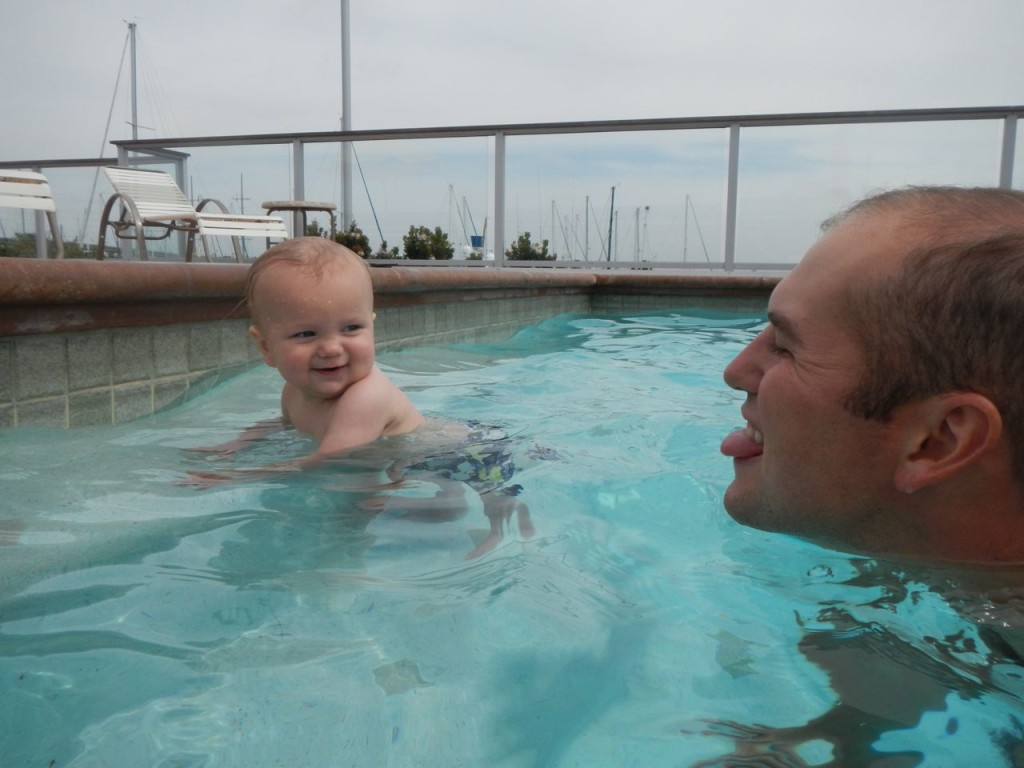 Sully likes standing on the steps in the pool