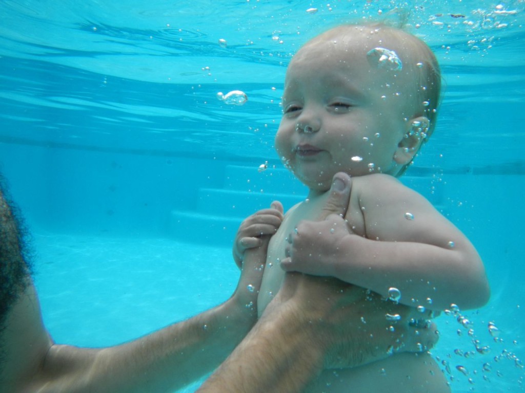 Practicing going under the water with me
